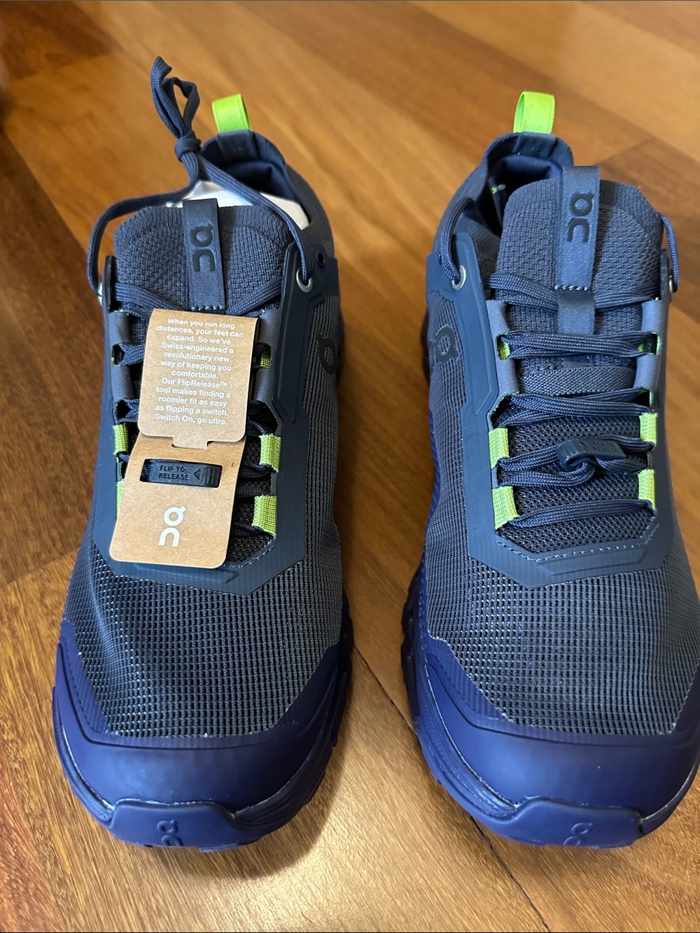 On Running Navy Sneakers with Neon Green Accents